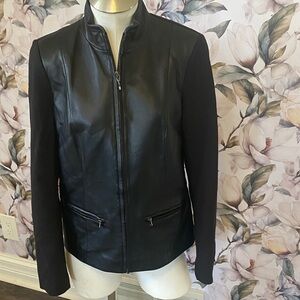 Talbots Black Leather Jacket with Zipper Pockets. Front is leather. Lined